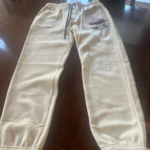 Mens Cream Joggers with Rose flower.
Good item for women also. Thick and warm